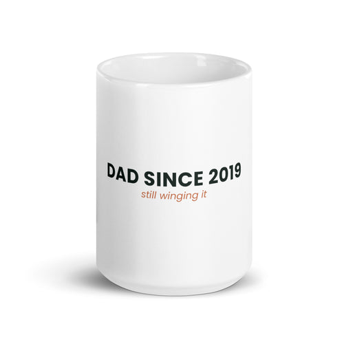 Personalised Dad Since mug with the year, Still Winging It, 15oz white glossy ceramic mug, front view